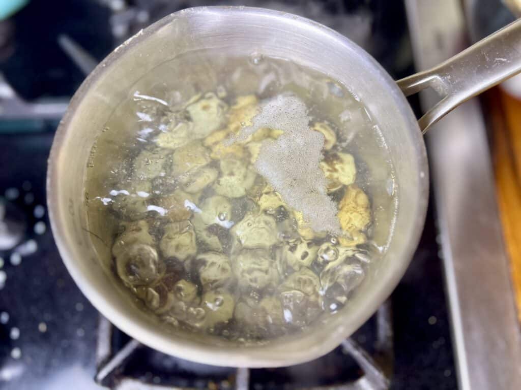 quail eggs cooking in boiling water. 
