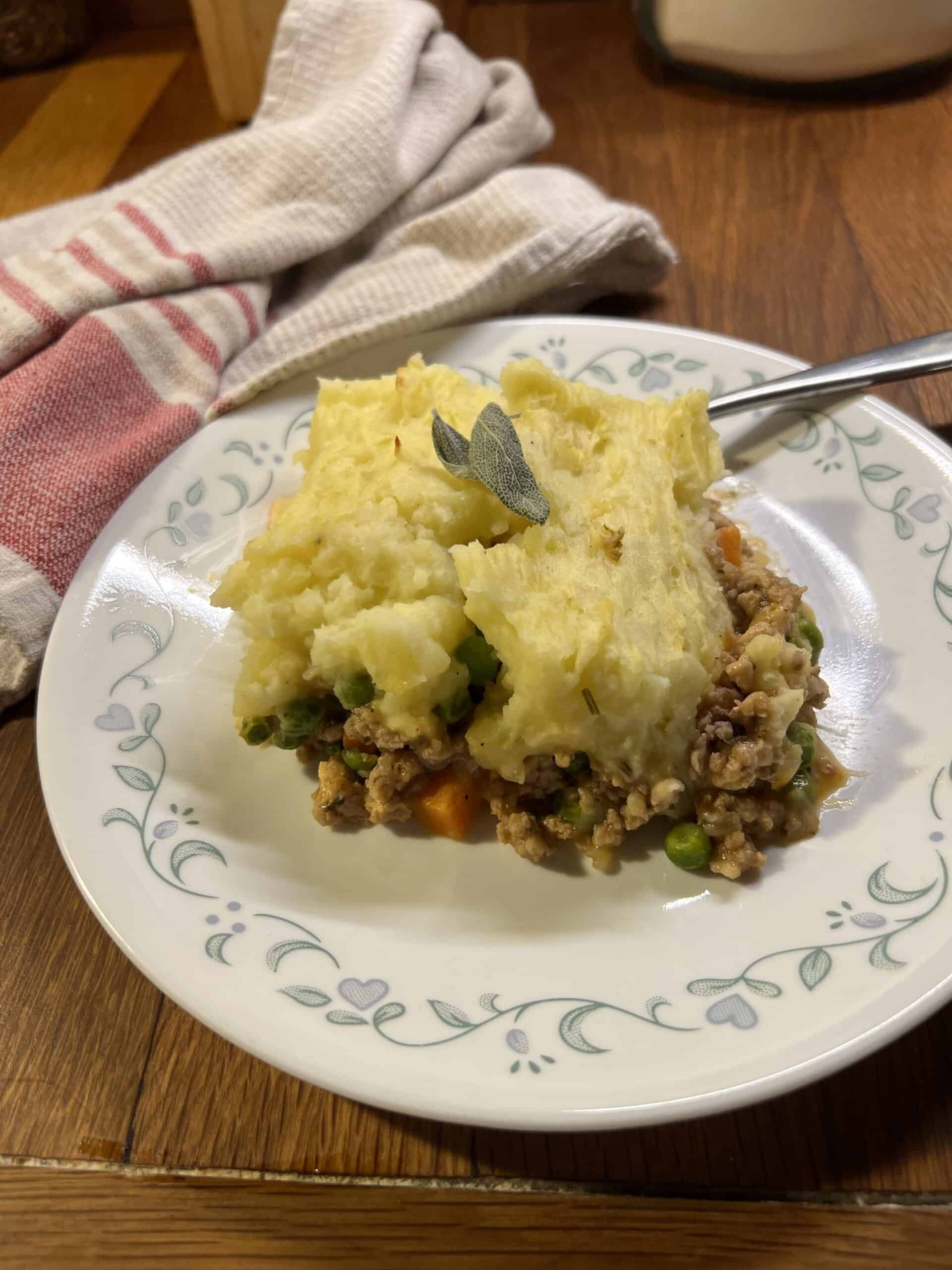 a piece of rabbit shepherds pie on a plate