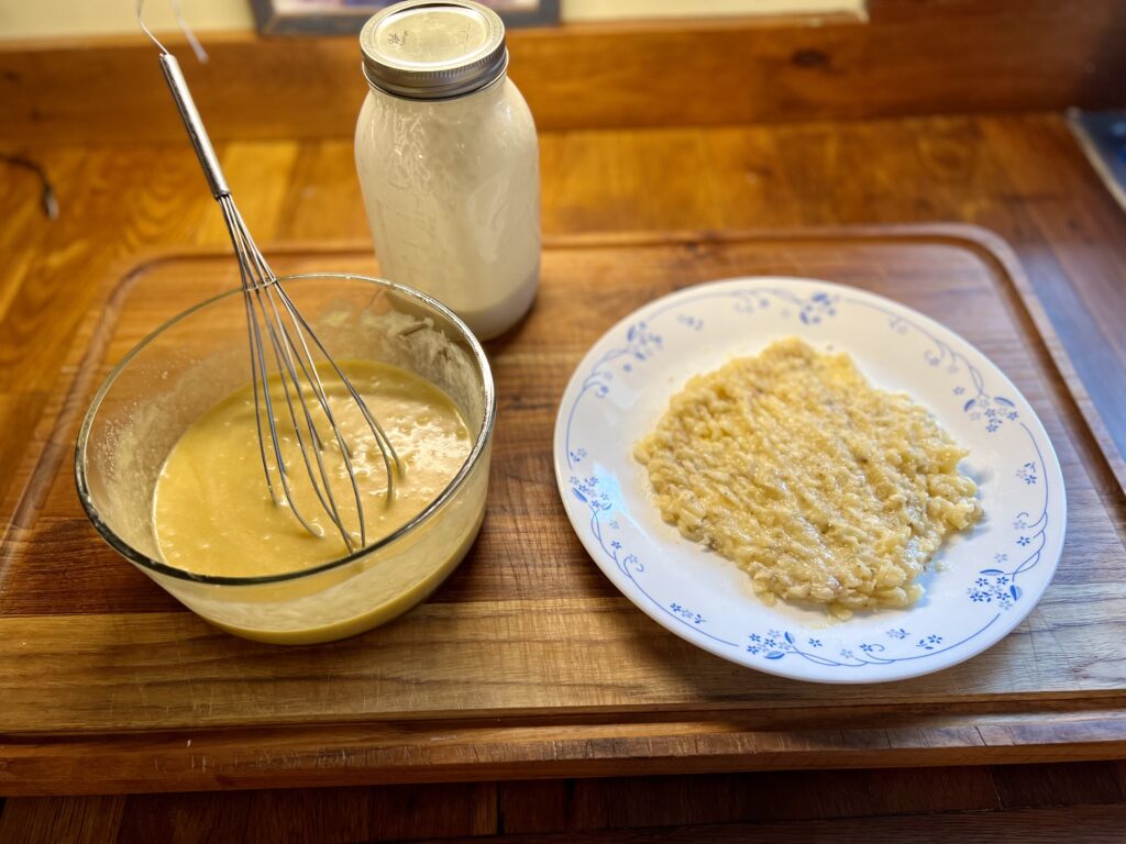 a picture of mashed banana on a plate and a bowl of the wet ingredients being mixed for the banana bread