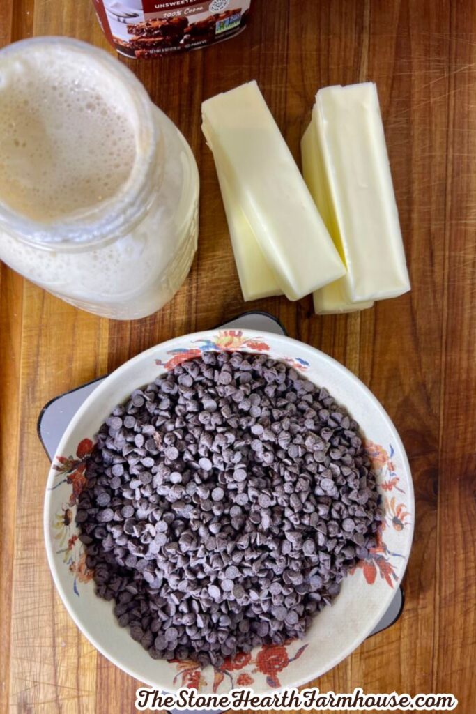 Sourdough starter and chocolate chips with butter prepared for baking