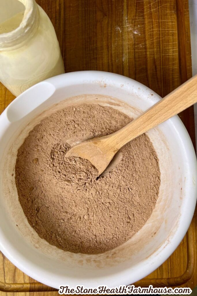 Dry ingredients for homemade sourdough discard brownies mixed in a bowl