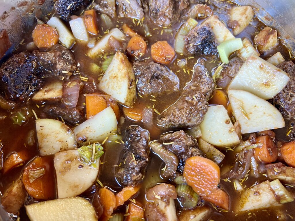Fully cooked close up of venison stew.