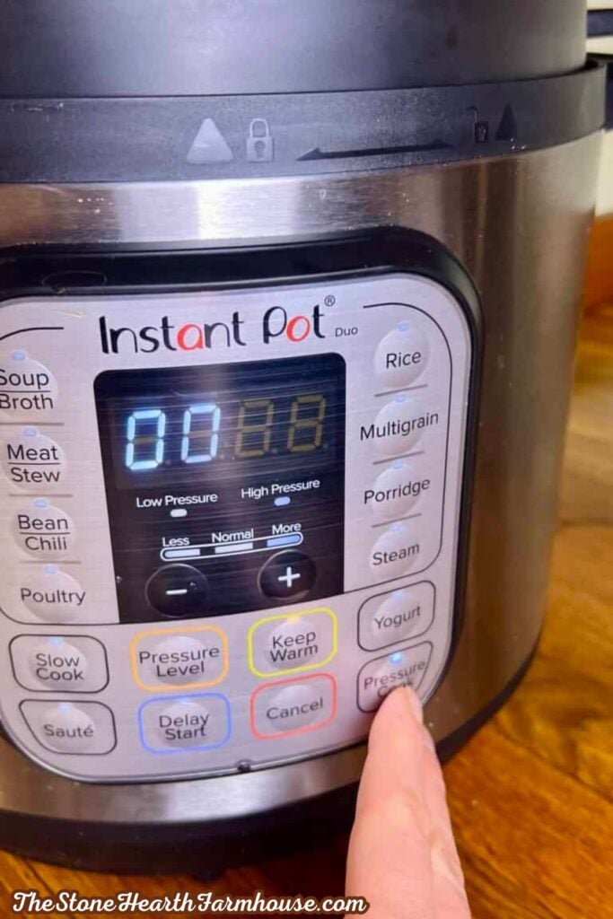 Instant Pot control panel showing the pressure cook setting for preparing hard boiled eggs.
