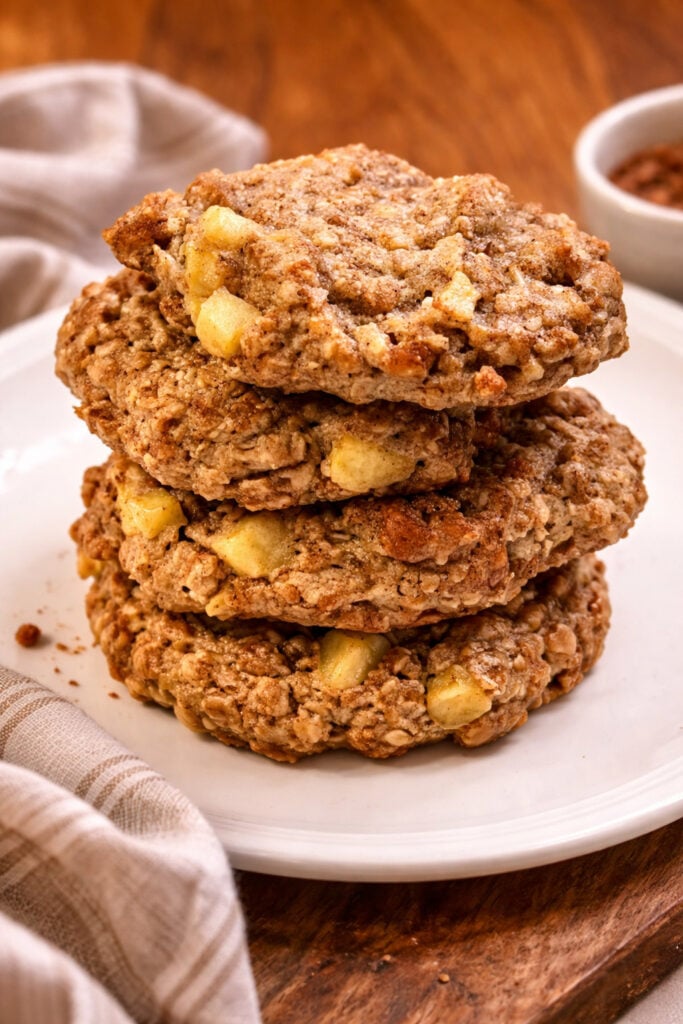 A stack of apple oatmeal cookies on a plate to show how yummy they look. 