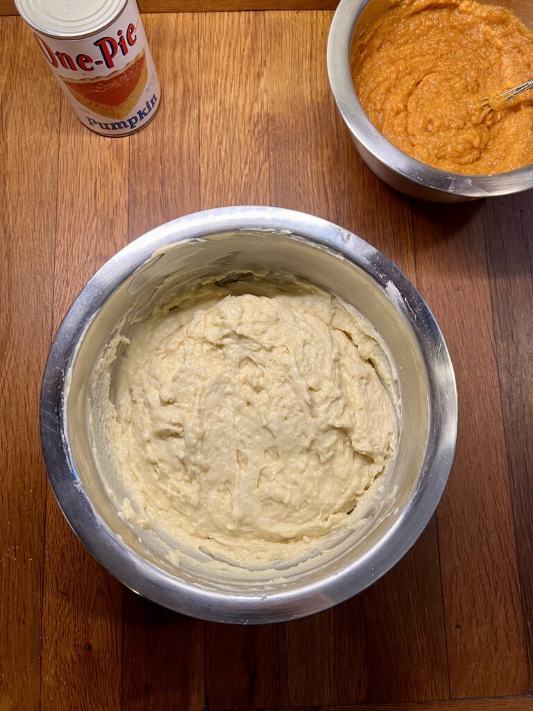 A bowl of pumpkin coffee cake batter. 