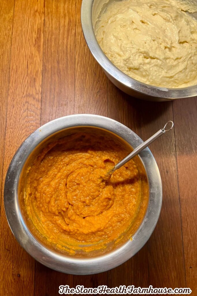 Bowl of smooth pumpkin puree ready to be added to a homemade fall dessert recipe.