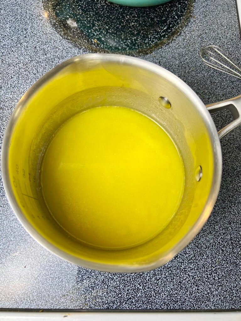 Brown butter melted in a saucepan for making brown butter sourdough chocolate chip cookies