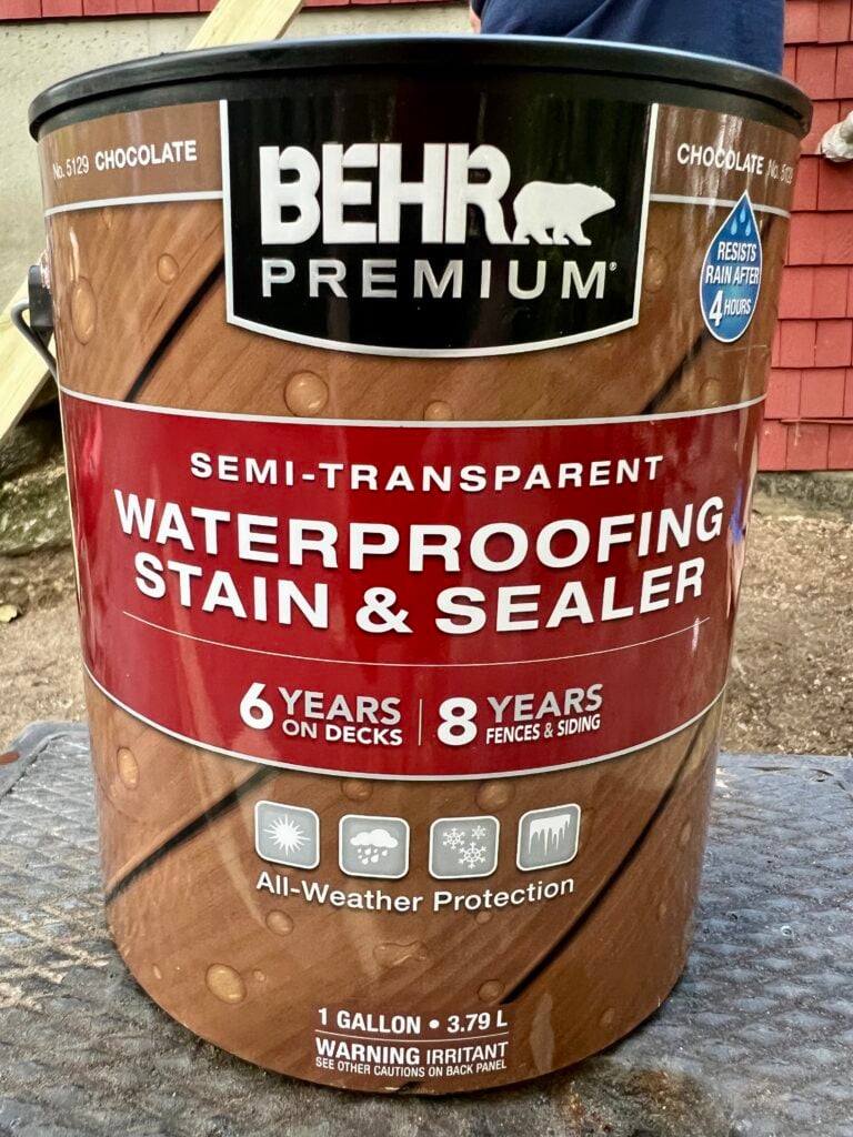 Stained deck beam and post corner after applying waterproof wood stain