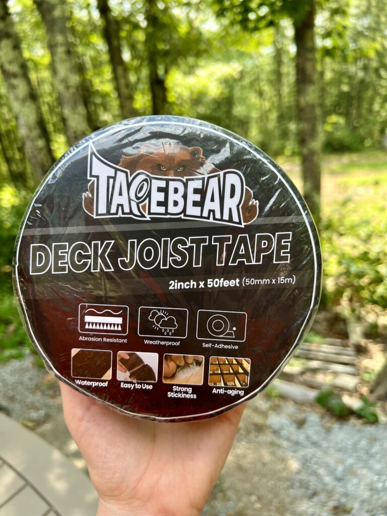 Roll of deck joist tape used to protect pressure-treated deck framing from moisture