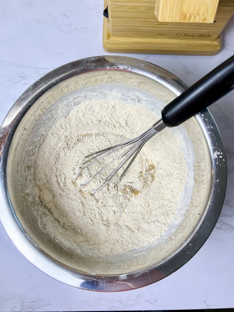 dry ingredients for brown butter sourdough Chocolate chip cookies in a bowl. 