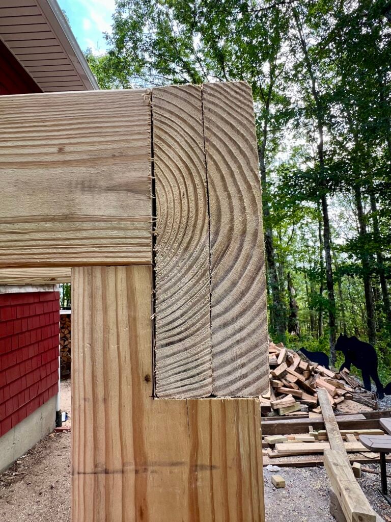 Deck beam and post connection detail showing structural framing for DIY deck