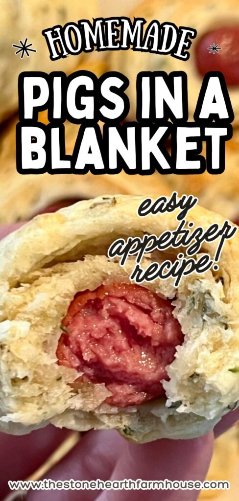 Pinterest-style graphic showing a close-up of a homemade pig in a blanket cut open, with flaky dough wrapped around a mini sausage and text reading “Homemade Pigs in a Blanket – easy appetizer recipe.”