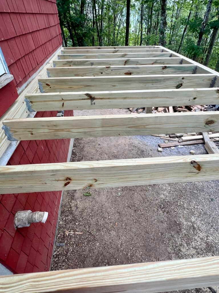 Deck joists installed and spaced evenly for Trex composite decking installation