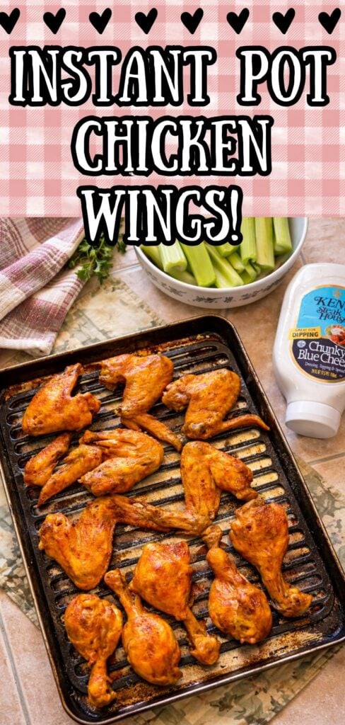 Instant Pot chicken wings on a baking tray with celery sticks and blue cheese dressing, crispy and oven-finished for an easy homemade appetizer recipe.