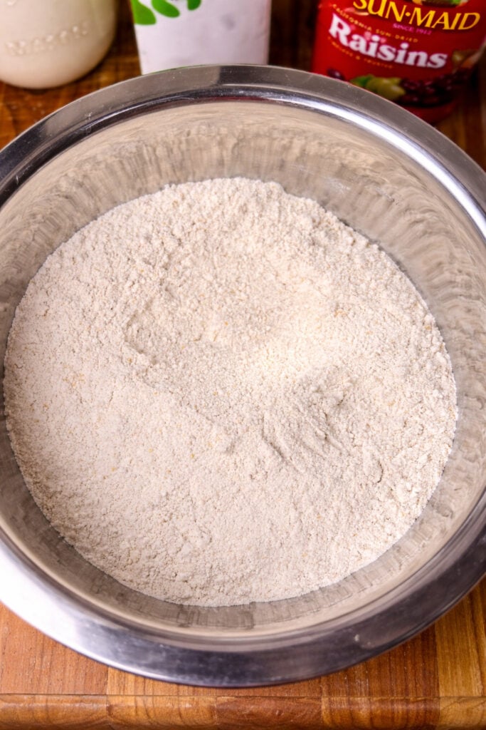 dry ingredients for sourdough Irish soda bread recipe in large mixing bowl with flour mixture