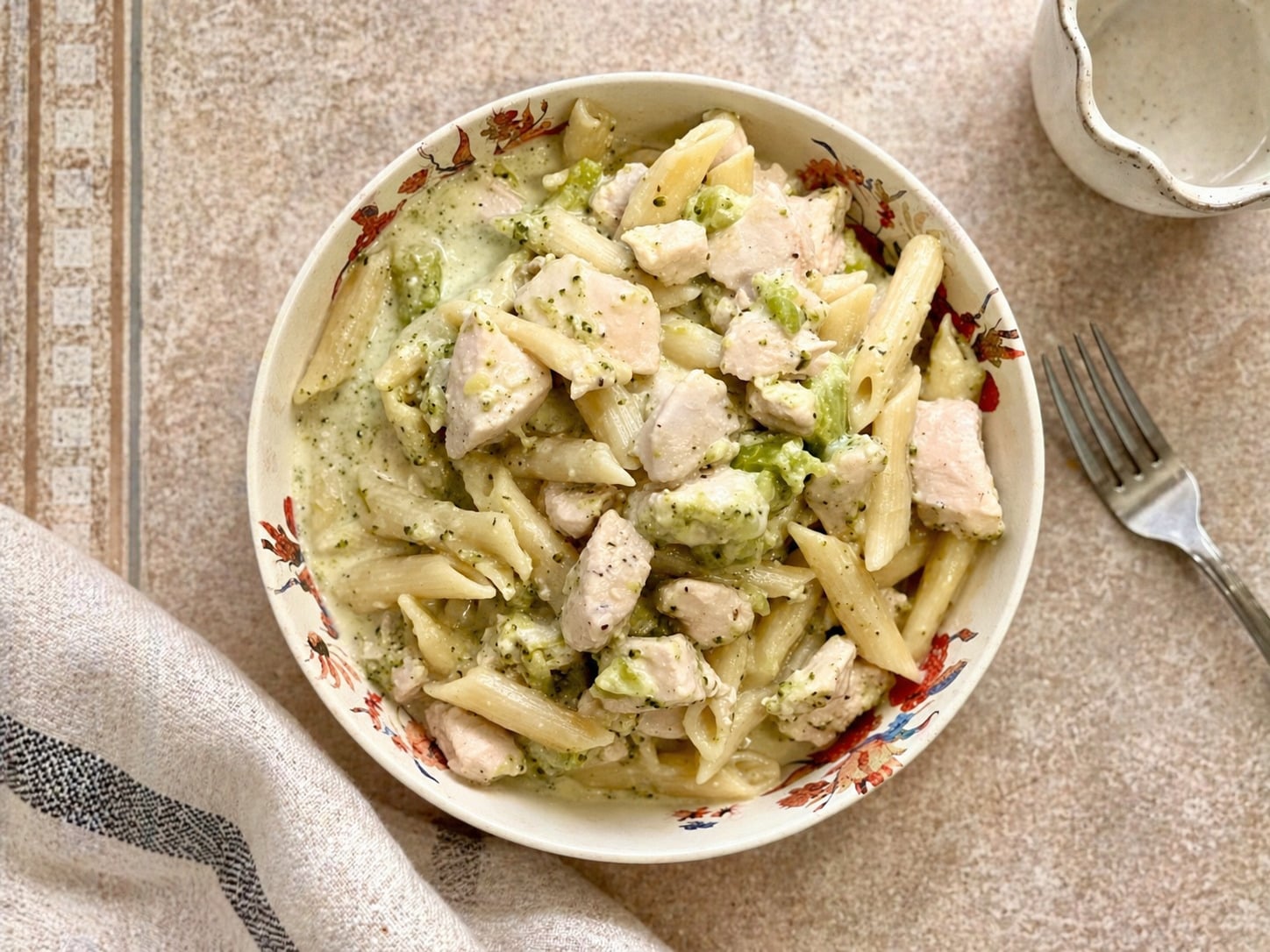 Top view of creamy instant pot chicken broccoli pasta with penne and tender chicken