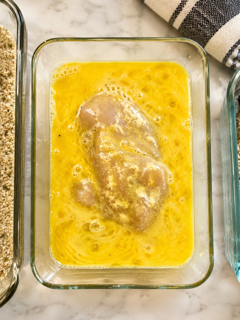 applebees lemon chicken recipe process dipping chicken breast into egg wash before breading
