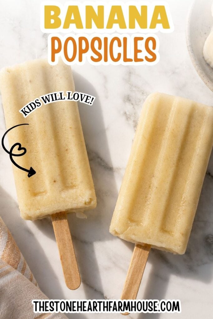 Creamy homemade banana popsicles on a marble countertop with a soft kitchen towel, styled food photography for an easy kid-friendly summer frozen treat recipe from The Stone Hearth Farmhouse.