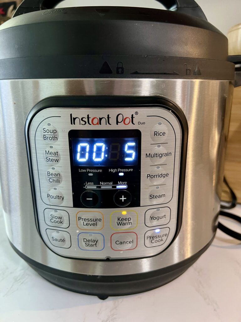 Instant Pot set to pressure cook for lasagna casserole recipe
