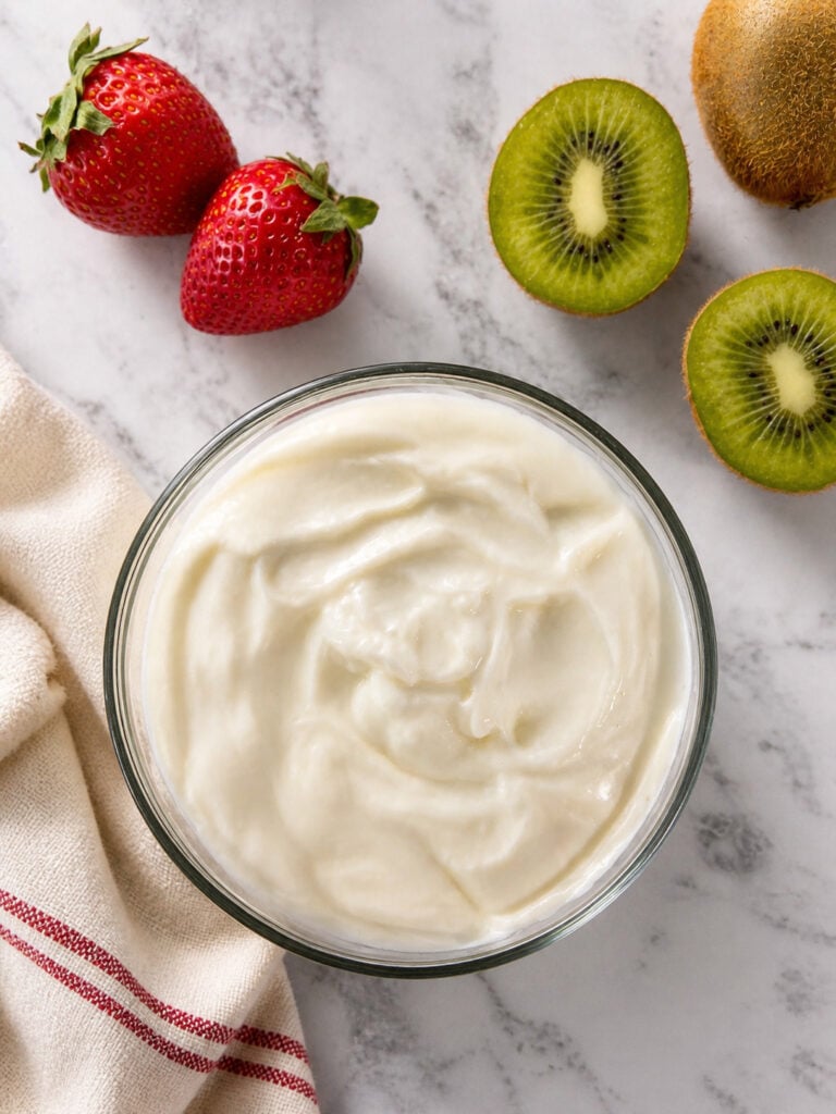 Fresh ingredients including strawberries, kiwi, yogurt, and honey for strawberry kiwi popsicles recipe