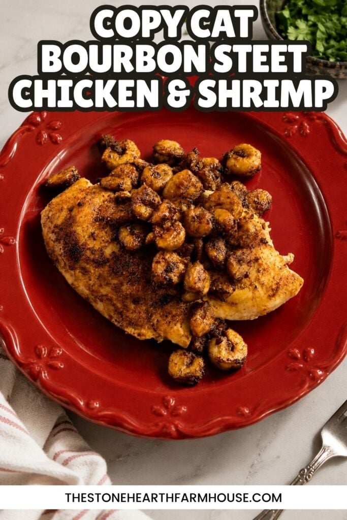 Copycat Bourbon Street chicken and shrimp recipe with tender Cajun-style chicken breast and savory garlic butter shrimp served on a red plate.