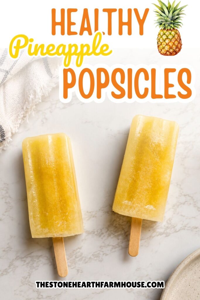 Pinterest pin for healthy homemade pineapple popsicles made with pineapple juice, featuring two pineapple popsicles on a marble countertop with the title "Healthy Pineapple Popsicles