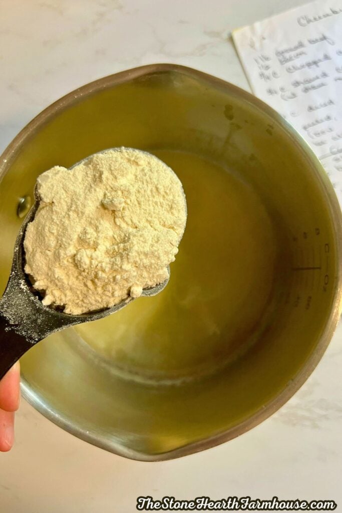 adding the flour to the roux.