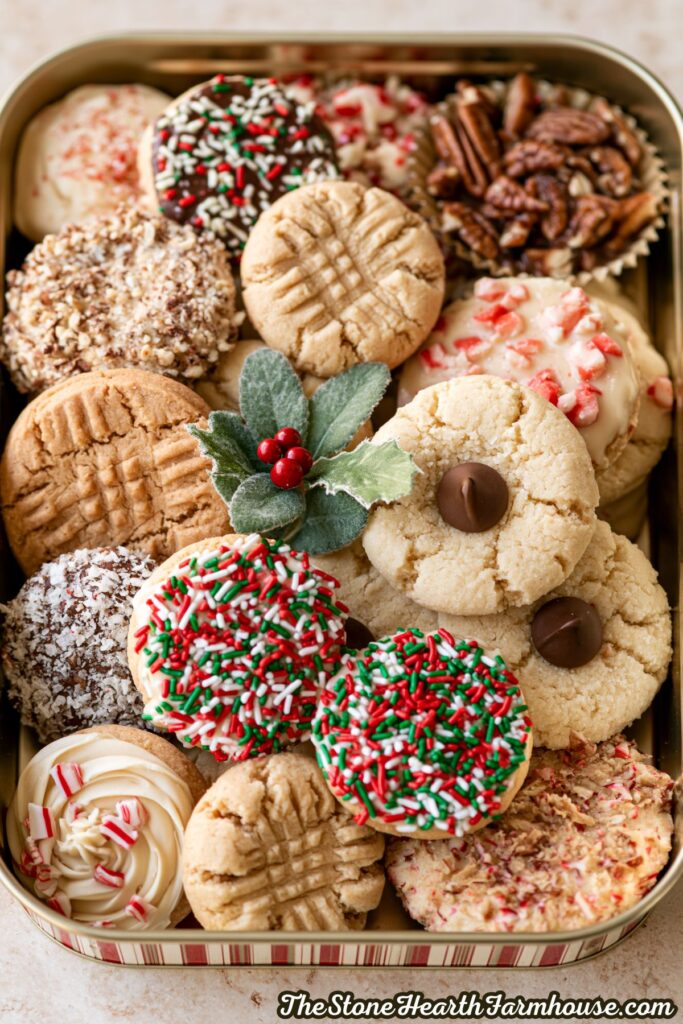 a tray of a variety of Christmas cookies in a Christmas tin.