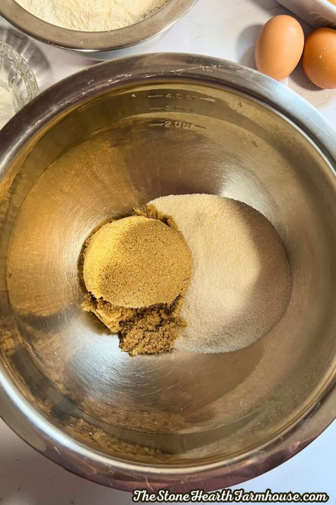 all the sugar in a stainless steel bowl.